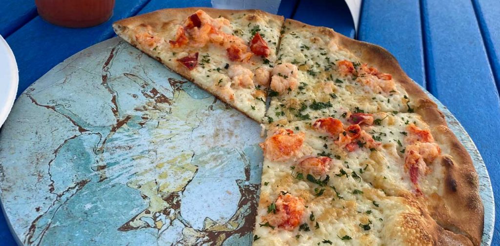 Try the World Famous Lobster Pizza at Seaside Cafe at the Mansion 1 lobster pizza