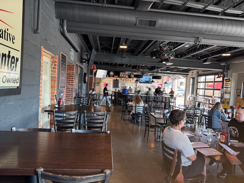 The Tire Station Kitchen & Tap: Medford's Best Dining Surprise 3 Inside The Tire Station Kitchen and Tap in Medford Wisconsin -- modern interior with large windows and tap bar