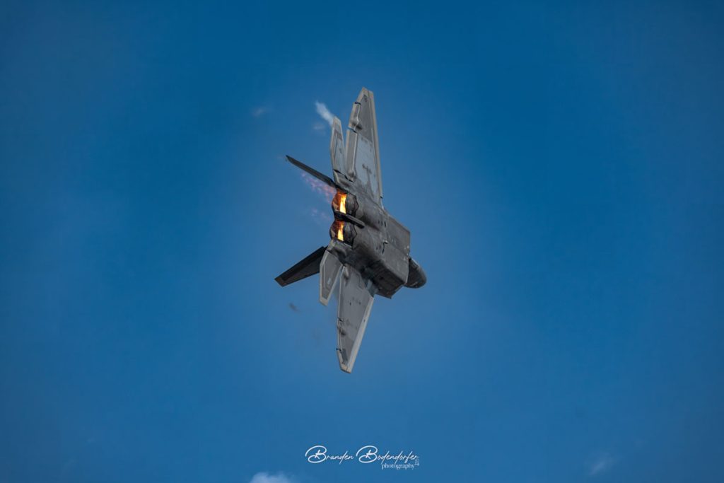 EAA AirVenture 2026: A Photographer's Packing & Shooting Guide 1 F22 Raptor making turn over EAA at Oshkosh